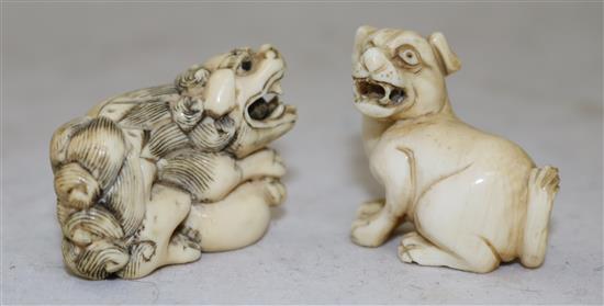 Two Japanese ivory netsuke of a shi-shi and a hound, 19th century, 3.9cm and 3.4cm